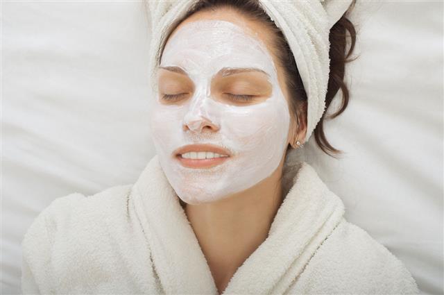 Young Woman With Facial Mask