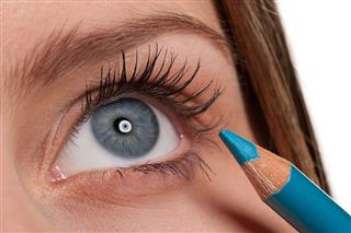 Woman Applying Make Up Pencil