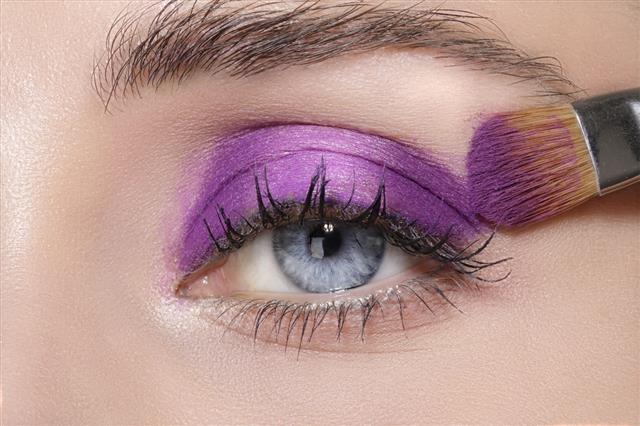 Woman Applying Eyeshadow