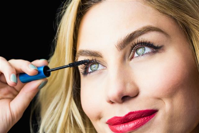 Woman Applying Mascara