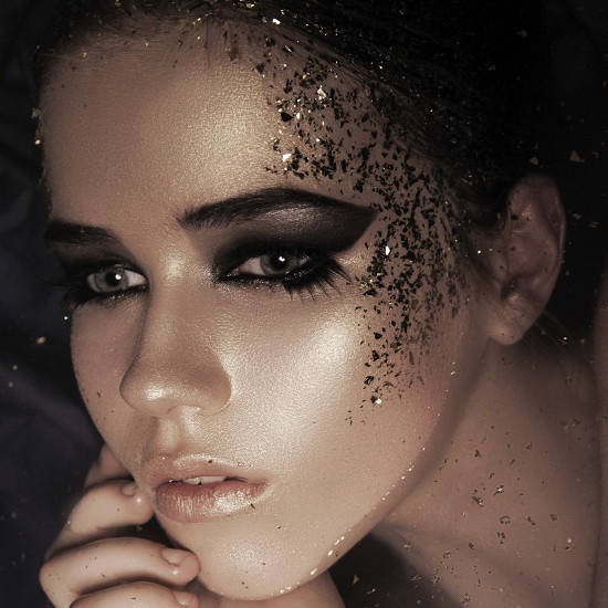 Avant-garde Eye Makeup with Black Eyeshadow and Glitter