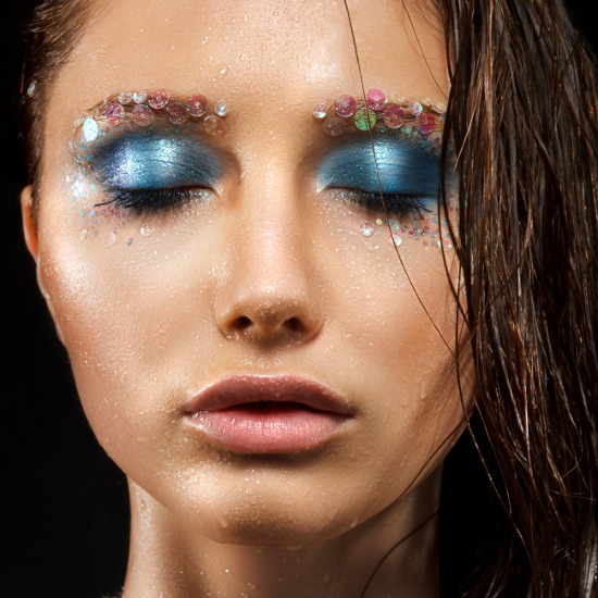 Avant-garde Eye Makeup with Blue Eyeshadow and Sequin