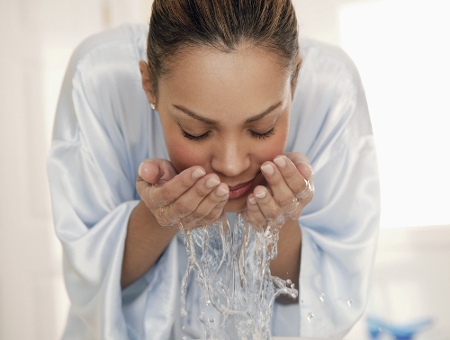Woman Washing her Face