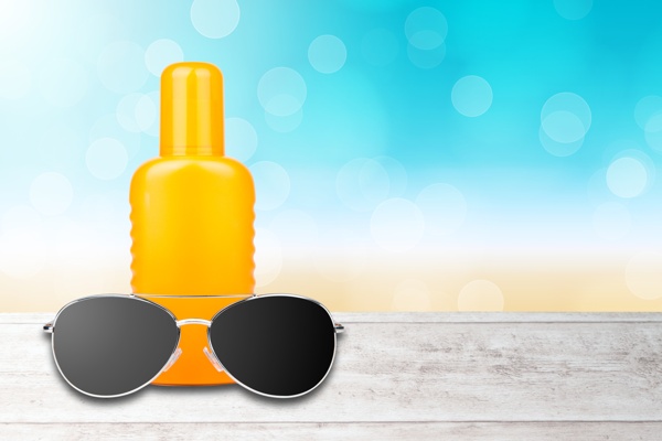 Sunglasses and lotion