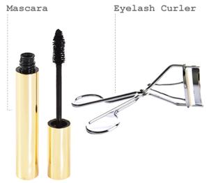 Black mascara and eyelash curler